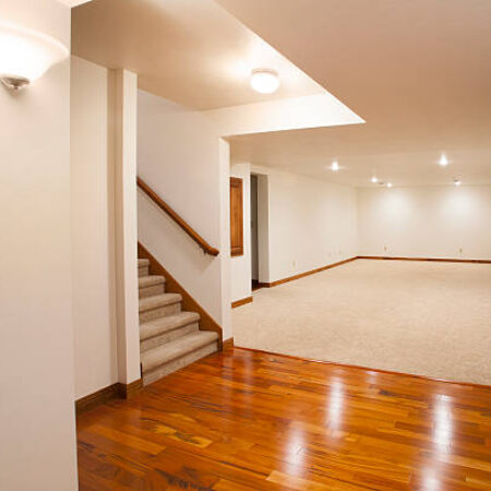 Spacious Finished Basement with Carpet and Hardwood Floors